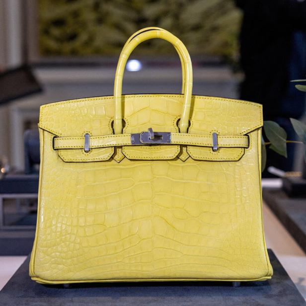 FILE PHOTO: A Mimosa Matte Mississippiensis Alligator Birkin handbag by Hermes is pictured during an auction preview at Sotheby's in Geneva